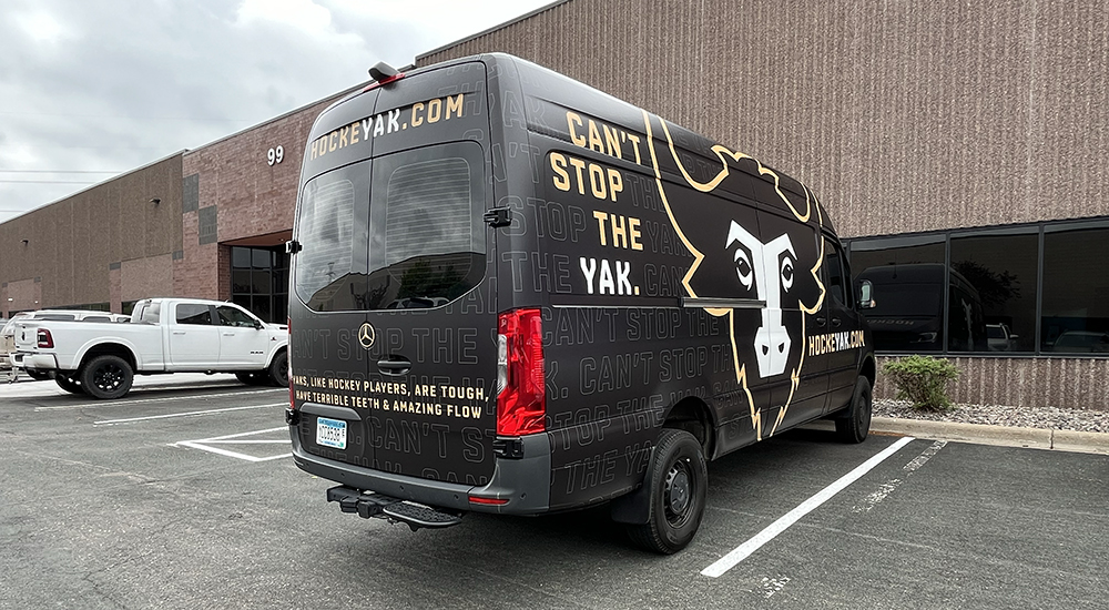 Custom graphics on a van of a yak for HockeyYak