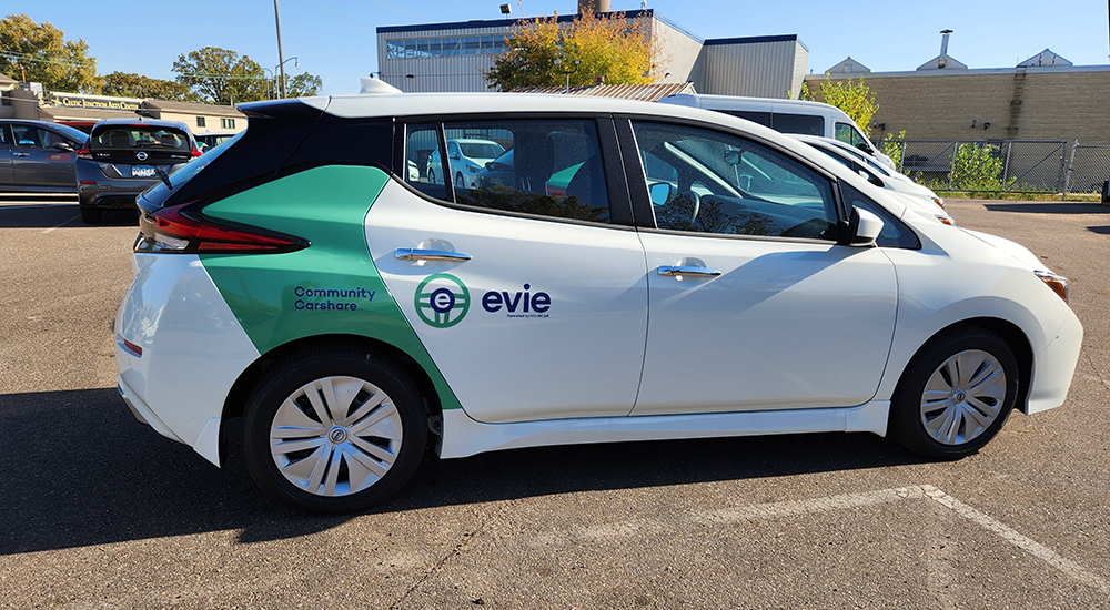 White cars wrapped with custom branding