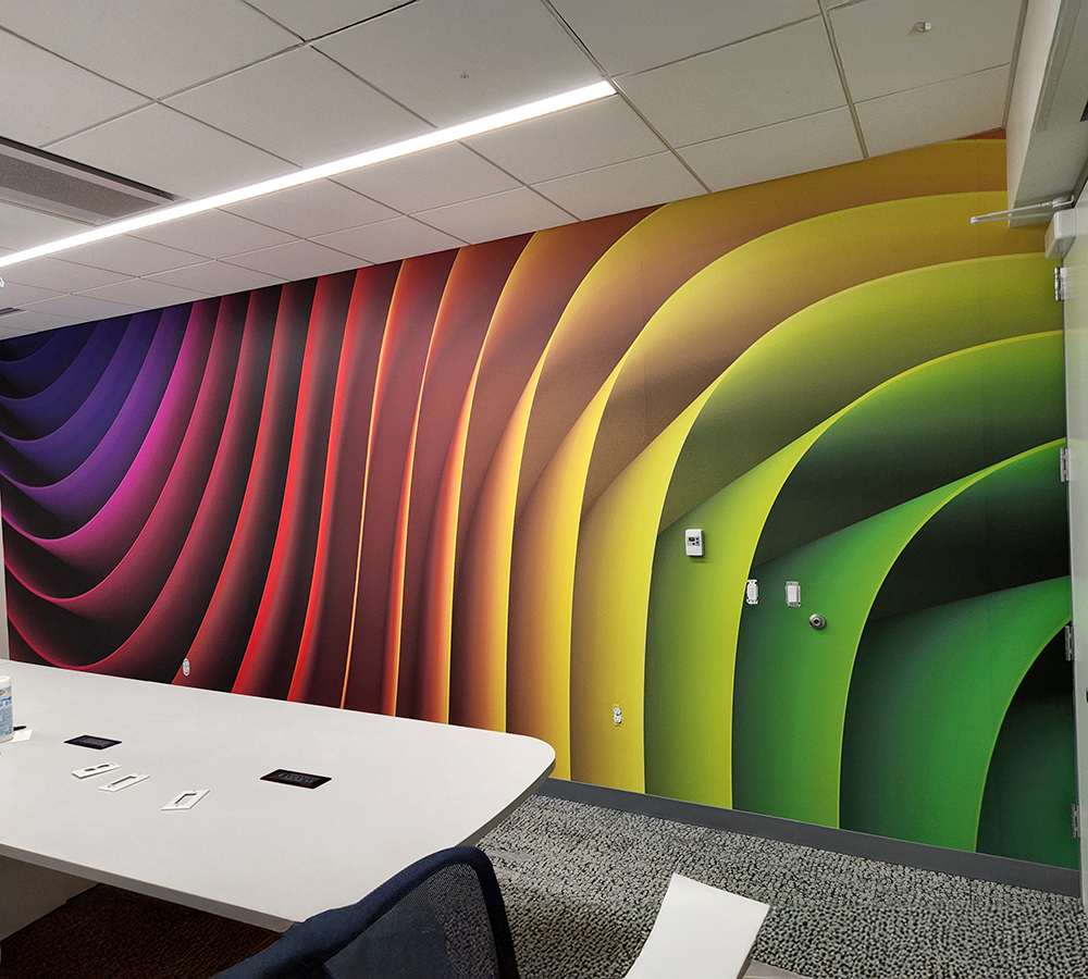 Wall graphic of ribbons of rainbow colors