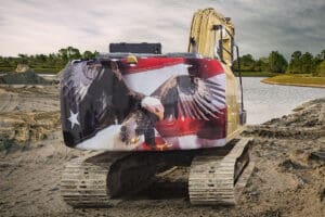 Charlson Excavating truck with American flag and eagle graphics applied to the rear of the excavating vehicle