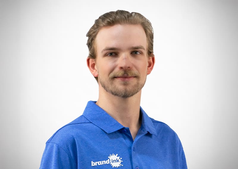 Professional head shot of James Aho, graphics installer at Brand Ink