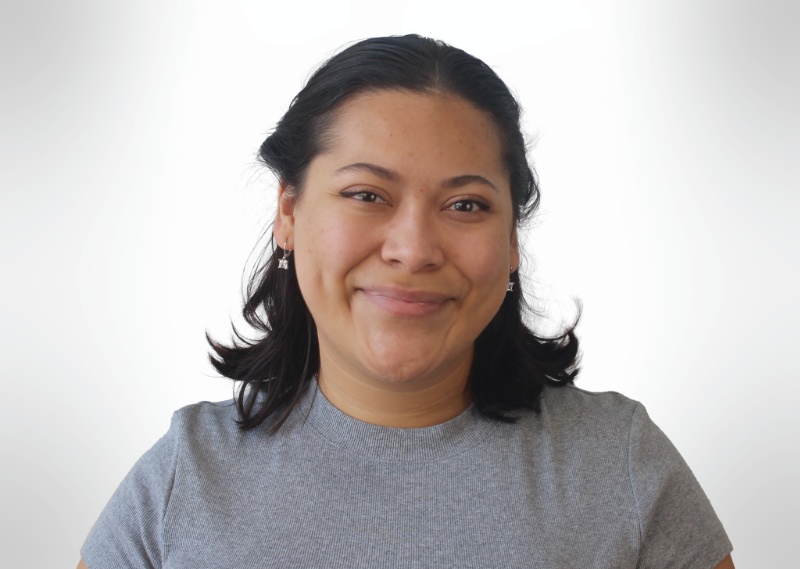 Headshot of Deanna Ayala Graphic Designer at Brand Ink in the Twin Cities.